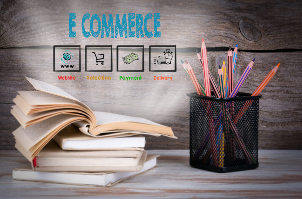 E commerce, Business Concept. Stack of books and pencils on the